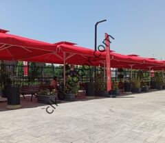 CLK 4,5x4,5 Metre Saçaklı LUX Model Krank Sistem Teleskopik Şemsiye Q90 Profil Kırmızı - Metal Hareketli Ayak 4 Mermerli (100x100cm 230 kg)